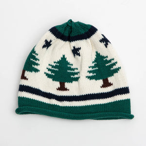 Baloo Baleerie knit striped hat in dark green, navy, and cream with dark green pine trees with brown trunks and navy star design