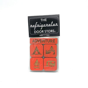 Adventure Wooden Magnet Set by 163 Design Company featuring colorful salmon-shaped wooden magnets on a display board.