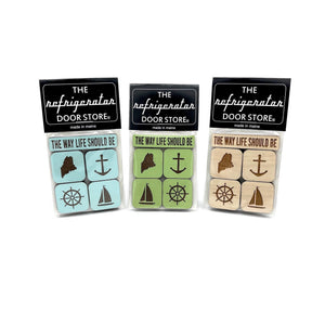 Set of wooden magnets from 163 Design Company featuring inspiring "The Way Life Should Be" messages, arranged on a surface.