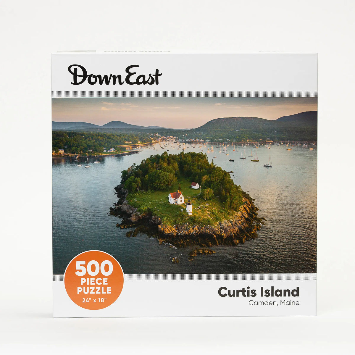 A colorful jigsaw puzzle of Curtis Island by Down East Products featuring scenic coastal views and vibrant island imagery.