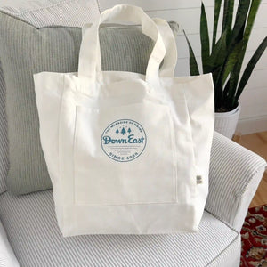 Down East Vintage Cover canvas tote bag with leather handles, featuring a stylish, durable design suitable for everyday use.