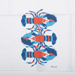Close-up of a nautical lobster print on a Festive Fish flour sack tea towel featuring a detailed lobster illustration.