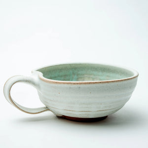 Handcrafted Good Land Pottery chowder bowl with a rustic finish, perfect for serving hearty soups and stews.