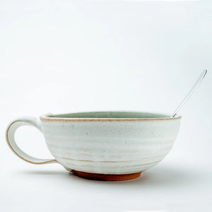 White ceramic chowder bowl by Good Land Pottery with a smooth, rounded shape and rustic finish.
