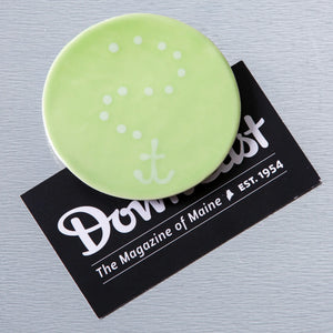Green ceramic anchor magnet by Lola Arts showing detailed glossy finish and nautical design on a white background.