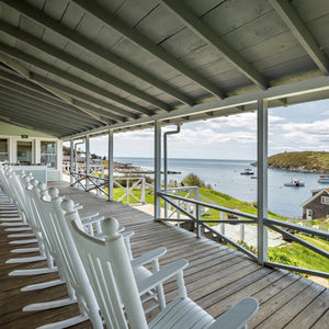 Birding workshop on Monhegan Island with Down East Adventures, featuring participants observing local bird species.