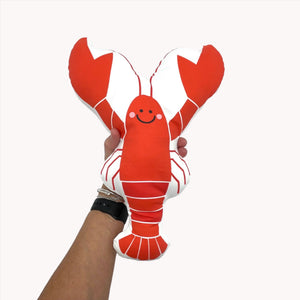Completed Nickwilljack Cut & Sew Lobster Kit featuring a detailed, handcrafted lobster made from fabric and sewing materials.