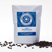 Organic Rock City Coffee Breakwater Blend beans, showcasing whole coffee beans from Rock City Coffee on a neutral background.
