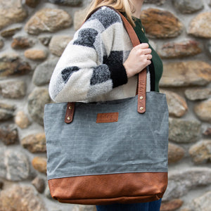 Rogue Industries Saco River Tote Bag in outdoor setting, showcasing durable fabric and spacious design for everyday use.