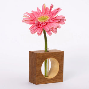 White oak bud vase by S.E. Hall Furniture, featuring a sleek, minimalist design ideal for displaying small flower arrangements.
