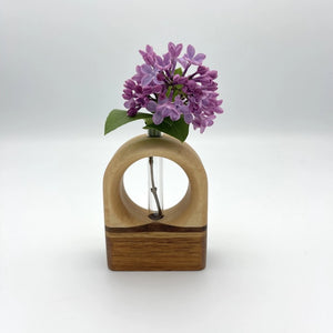 Elegant Arch Bud Vase by S.E. Hall Furniture in maple, walnut, white oak, or mahogany, showcasing a stylish ceramic design.