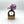 Walnut, maple, and white oak Arch Bud Vase by S.E. Hall Furniture with a sleek, curved design suitable for floral displays.