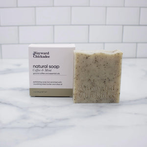 Wayward Chickadee coffee and mint natural soap bar with a textured, handcrafted appearance and fresh, invigorating scent.