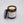 Wayward Chickadee Downeast Dew scented candle in a glass jar with a natural wax finish, showcasing the product without a lid