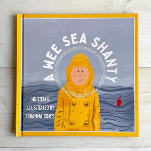 A children's book titled 'A Wee Sea Shanty' features a character in a yellow raincoat on the cover.