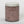 Load image into Gallery viewer, Bee Balm and Nettle back view of glass jar of hibiscus and lavender bath &amp; shower scrub showing the flecks of hibiscus and lavender throughout the rose colored scrub
