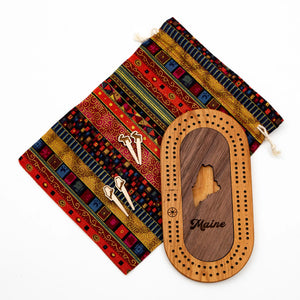 Mini Maine Cribbage Board by Cast & Carve with walnut inlay, showing a compact wooden cribbage game board with detailed craftsmanship.