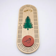 Cast & Carve Pine Tree Epoxy Cribbage Board featuring a detailed pine tree design and smooth epoxy finish.