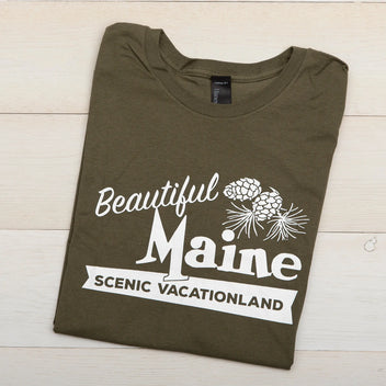 Gray Maine T-shirt by Down East Products featuring a scenic graphic of Maine landscapes and the word "Beautiful."