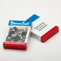 Vintage Down East Products playing cards with colorful illustrated covers featuring traditional designs and artwork.