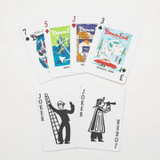 Vintage Down East Products playing cards with colorful illustrated covers, featuring classic and nostalgic designs.