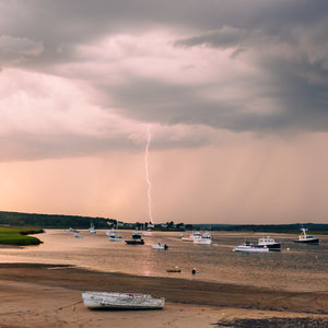 Landscape of coastal Maine during sunset at Southern Maine Photography Workshop, featuring rugged shoreline and vibrant sky.