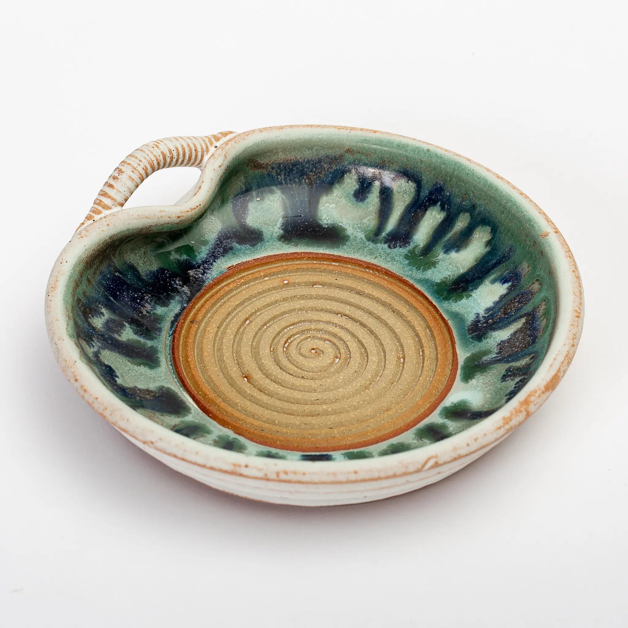 https://shop.downeast.com/cdn/shop/files/good-land-pottery-garlic-grater-03.webp?v=1682888040
