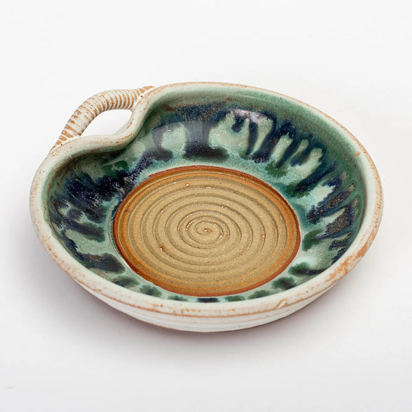 https://shop.downeast.com/cdn/shop/files/good-land-pottery-garlic-grater-03_600x.webp?v=1682888040