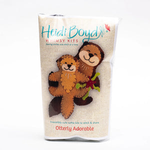 Heidi Boyd Whimsy Felt Kit featuring adorable otters with colorful felt pieces and crafting supplies for creating cute felt figures.