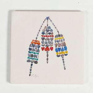 Colorful Love Rocks Coasters with buoy design by Love Rocks Me, showcasing vibrant, beach-inspired drink coasters.