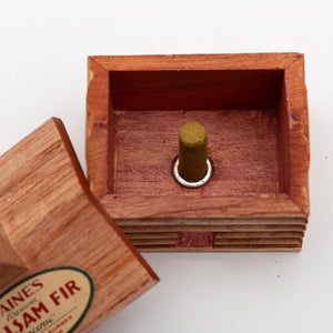 Paine Products Cabin Incense Burner with rustic wooden design and metal holder for burning incense sticks.