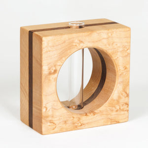 Elegant S.E. Hall Furniture bud vase in birdseye maple and walnut with a smooth, rounded shape and natural wood grain details.