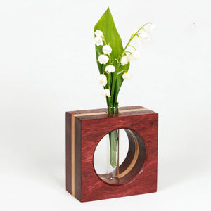 S.E. Hall Furniture bloodwood maple bud vase with a smooth, rounded shape and natural wood grain finish.