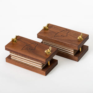 Walnut Pocket Flower Press by S.E. Hall Furniture, showcasing compact wooden design with metal screw closures for pressing flowers.