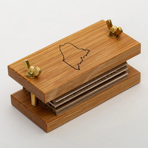 White oak pocket flower press by S.E. Hall Furniture with adjustable screws for preserving pressed flowers and botanical specimens.