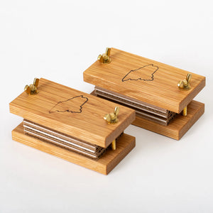 White oak pocket flower press by S.E. Hall Furniture with a compact, sturdy design for pressing and preserving flowers.