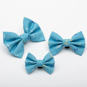 Set of Tealight Studios pet bows featuring anchor designs, colorful fabric patterns, perfect for pet accessories and styling.