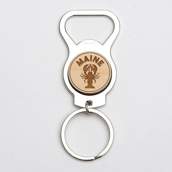163 Design Company metal keyring with attached metal bottle opener with wooden middle with the word MAINE and a lobster