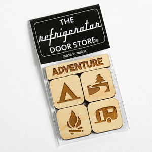 Wooden magnet set from 163 Design Company featuring adventure-themed natural wood designs and colorful magnetic pieces.