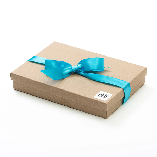 A&E Stoneworks ornament set gift box with turquoise ribbon and bow