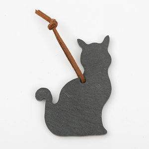 A&E Stoneworks slate ornament featuring a carved cat design, showcasing natural stone texture and detailed craftsmanship.