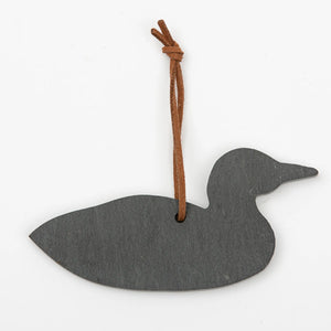 A&E Stoneworks slate ornament featuring a carved loon design, showcasing natural stone texture and detailed craftsmanship.