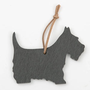 Slate ornament featuring a carved Scottie dog design by A&E Stoneworks, showcasing detailed craftsmanship and natural stone texture.