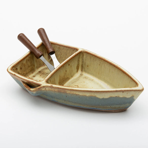 Ash Cove Pottery top view of pottery double dip dinghy dish with two appetizer knives resting in dish