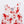 Load image into Gallery viewer, Baloo Baleerie closeup of child&#39;s white romper with red lobsters repeated design and 2 snap closure on both shoulders showing one side unsnapped
