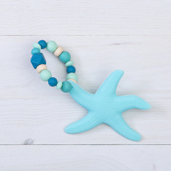 Baloo Baleerie aqua silicone starfish with ring of silicone beads in cream, mint, turquoise, and teal attached