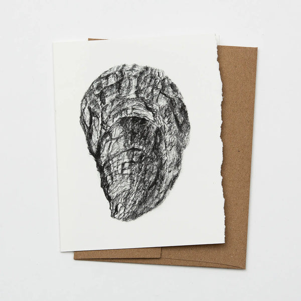 Beeyond Hope Farm charcoal illustration of a Johns River II oyster on a blank ivory colored greeting card with matching kraft paper envelope