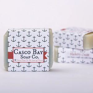 Bar soap from Casco Bay Soap Co. featuring a blueberry cream scent with a vibrant blue color and smooth texture.