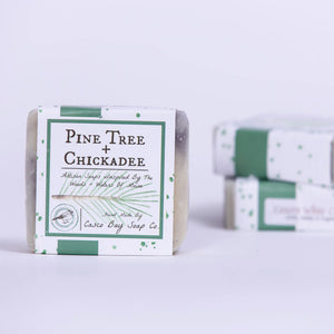 Bar soap by Casco Bay Soap Co. featuring Eastern White Cedar scent, with a creamy white appearance and natural cedar aroma.