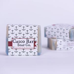 Bar soap from Casco Bay Soap Co. with sea mist scent, featuring a natural, handcrafted look in a rustic soap bar.